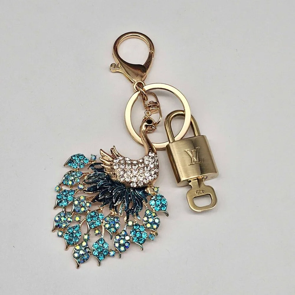 Authentic Louis Vuitton Gold Lock 🔒 Keychain Bag Unbranded Peacock Charm LV